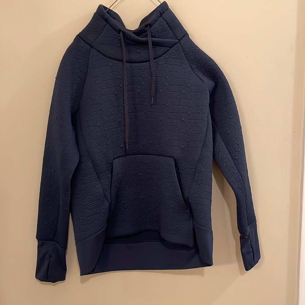 Medium dark blue athleta sweater. Polyester. Good condition.